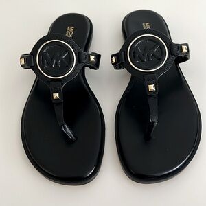 NWOT. Michael, Michael Kors, thong sandals.